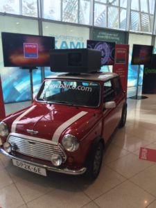 The DP2K-6E projector on the roof of a traditional red mini in the entrance to conference became a real photo requirement.